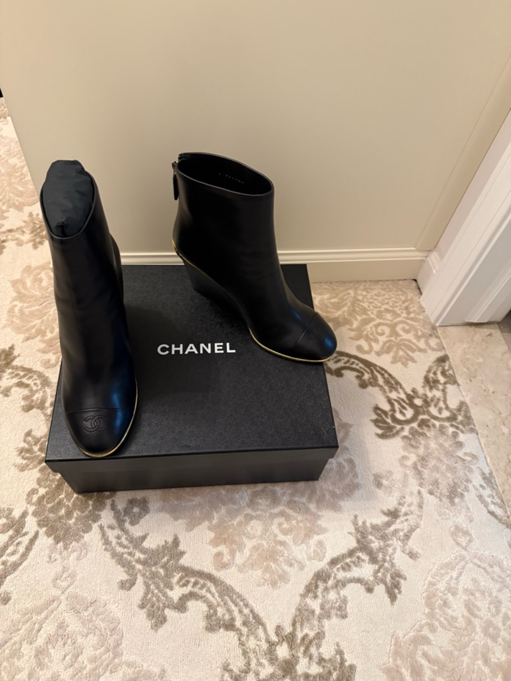 CHANEL Black Leather Ankle Booties with Gold Edge
